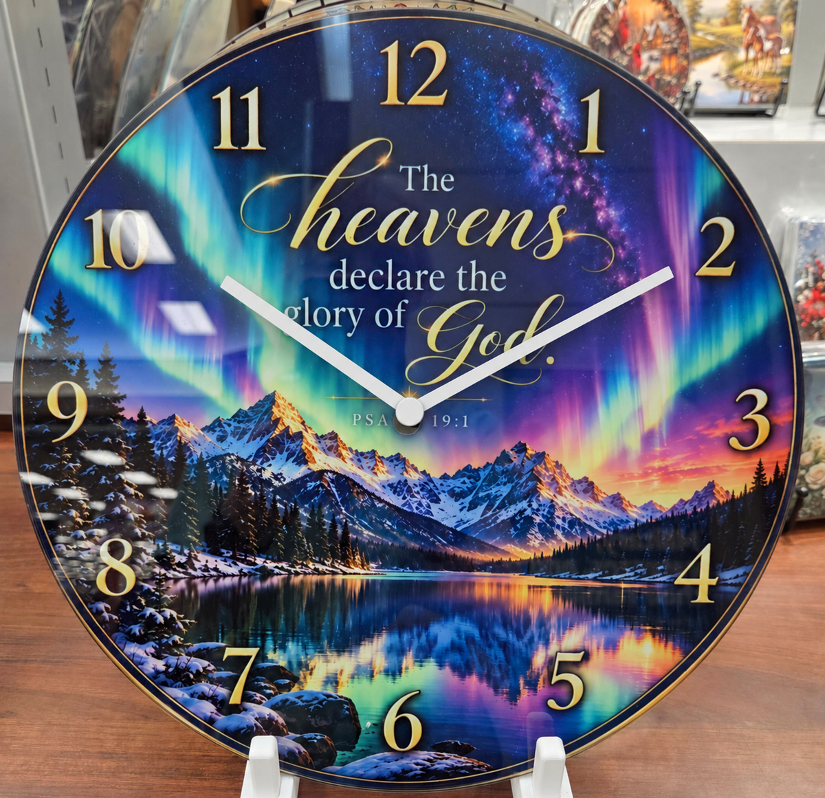 The Heavens Declare Aurora Scripture Wall Clock – 12″ Glass