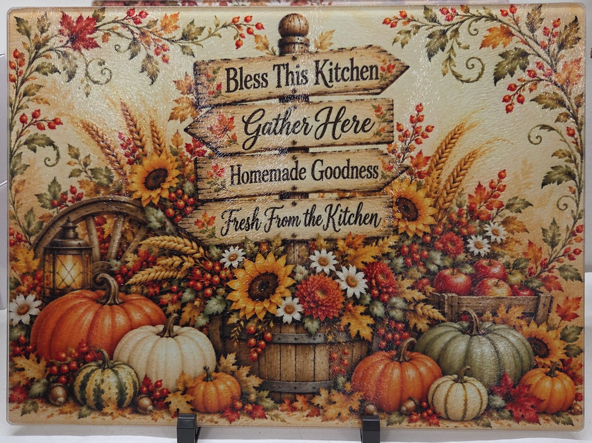 Actual Bless This Kitchen autumn harvest glass cutting board with pumpkins, sunflowers and rustic wooden direction signs