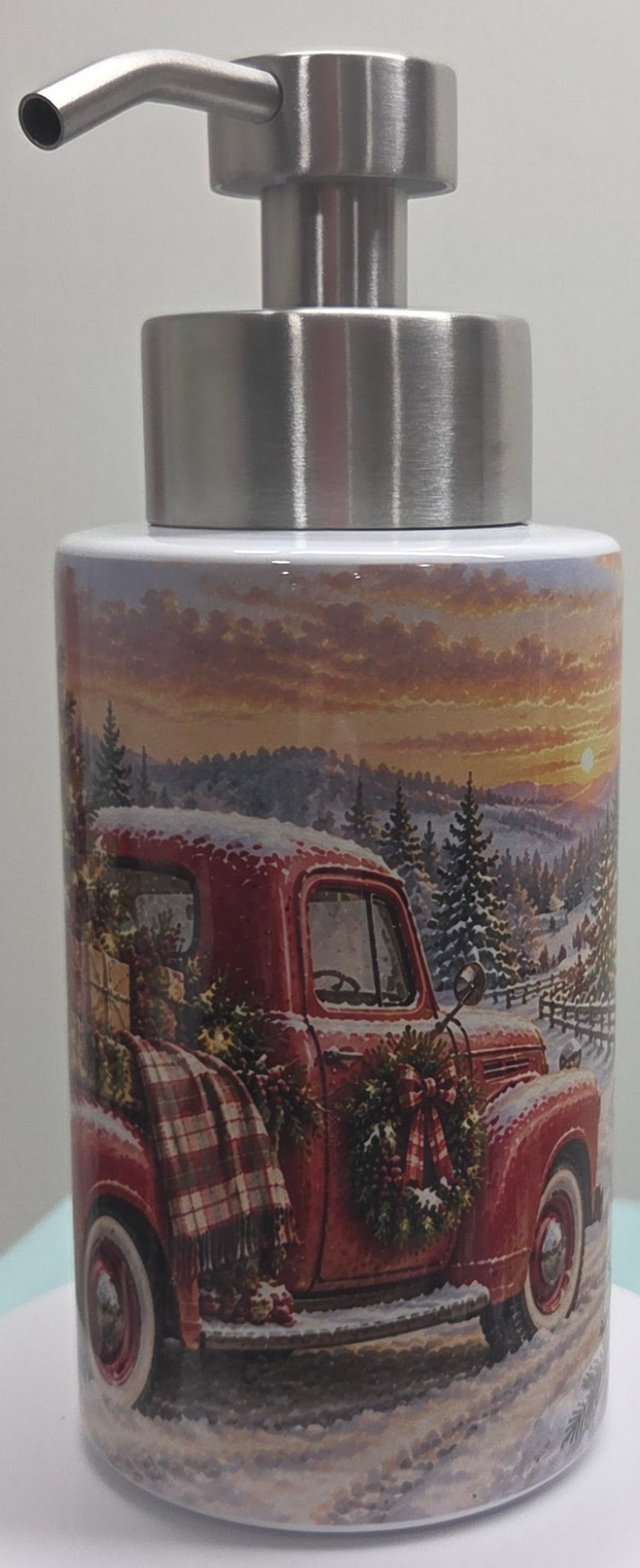 Actual Christmas red truck dispenser photographed from pickup truck side