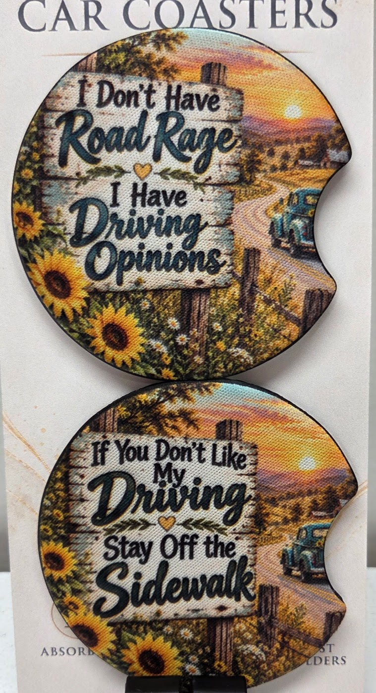 Actual photo of two funny driving quote car coasters with sunflowers and country road design
