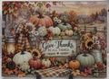 Real glass cutting board featuring Give Thanks in All Things with pumpkins and rustic autumn farmhouse decorations
