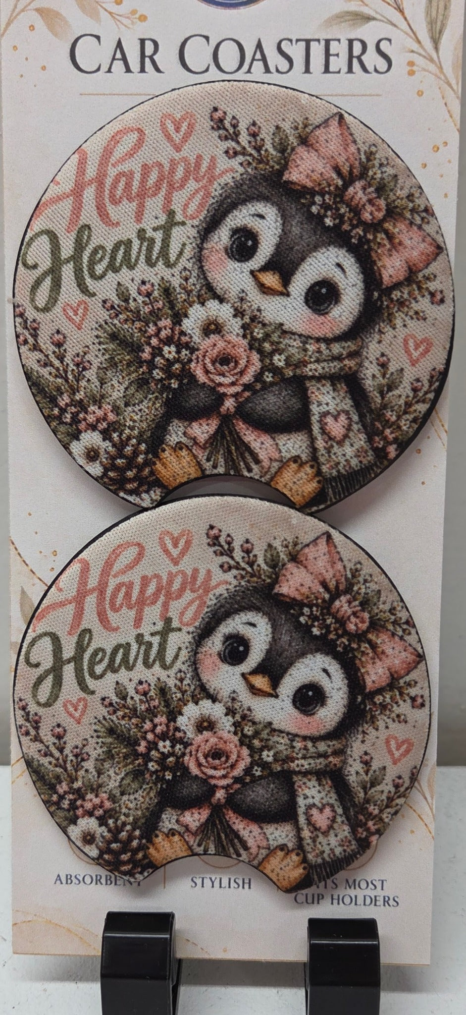 Actual set of two Happy Heart penguin floral neoprene car coasters with finger notches