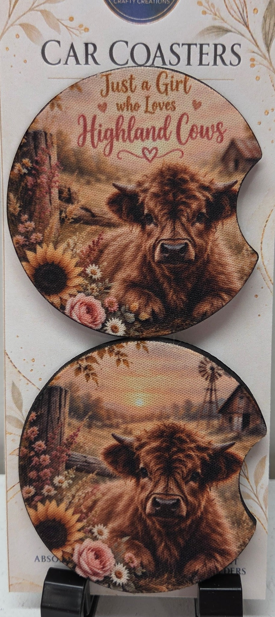 Two Highland cow neoprene car coasters with finger notches; one has Just a Girl Who Loves Highland Cows lettering