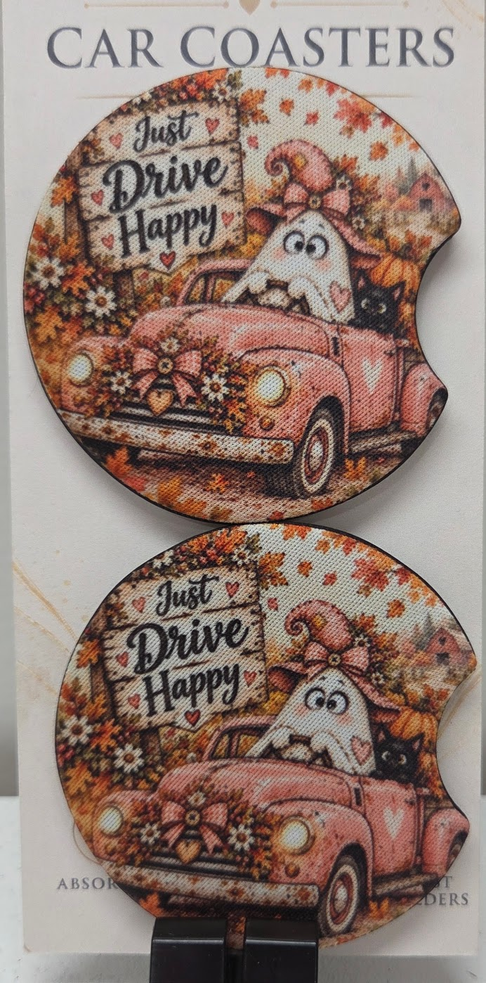 Actual photo of matching Just Drive Happy pink car and ghost neoprene car coasters with finger notches
