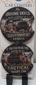 Two real neoprene off-road truck coasters with finger notches and humorous driving phrases