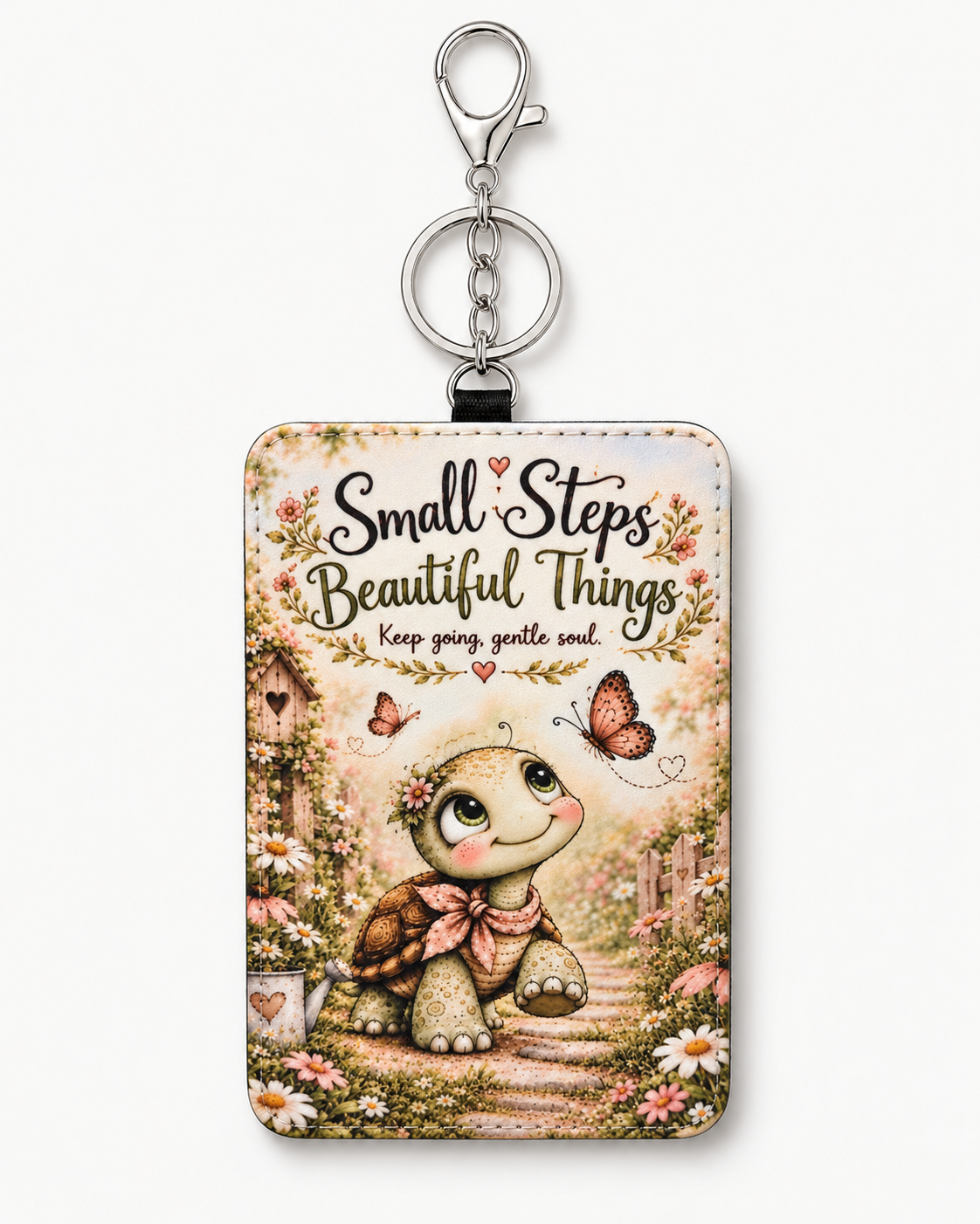 Turtle Small Steps Beautiful Things ID holder on white background with silver clasp and keyring